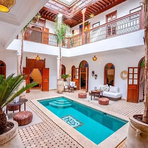 Riad Adika &